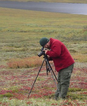 2007 Artist in Residence Carl Johnson photographing tundra plants in Gates of the Arctic. 2007 Artist in Residence Carl Johnson photographing tundra plants in Gates of the Arctic.