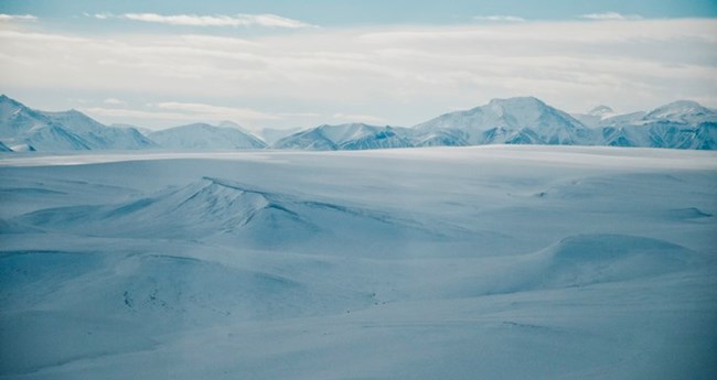 A bluish daytime hue in the Brooks Range mountains during winter