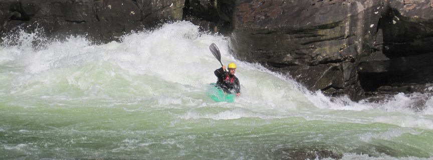 kayaker in rapids