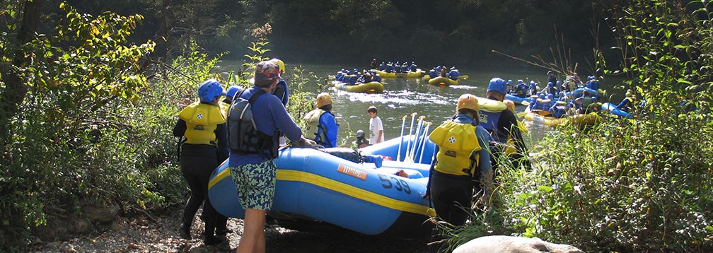 rafters carry rafts to the river