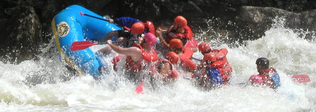rafters plunging through rapids rafters plunging through rapids