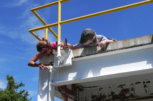 Youth from St. Charles Presbyterian Church in Missouri help repaint a radar platform in the summer of 2014. Youth from St. Charles Presbyterian Church in Missouri help repaint a radar platform in the summer of 2014.