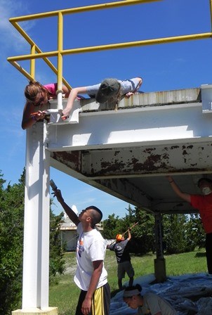 Painting a structure in the radar section of Fort Hancock and Sandy Hook Proving Ground National Landmark District.