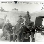 12 inch gun crew at hoist.