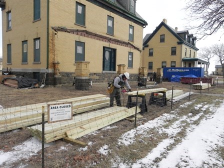 An NPS employee with the Historical Preservation Training Center in Frederick, Maryland, restores an historic porch at Fort Hancock's Officers Row, part of Gateway's Sandy Hook Unit. An NPS employee with the Historical Preservation Training Center in Frederick, Maryland, restores an historic porch at Fort Hancock's Officers Row, part of Gateway's Sandy Hook Unit.