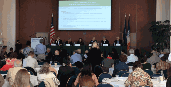 Panelists answer questions from the audience following their individual presentations.