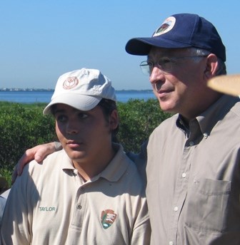 Taylor Ramos with U.S. Interior Secretary Ken Salazar in 2010.