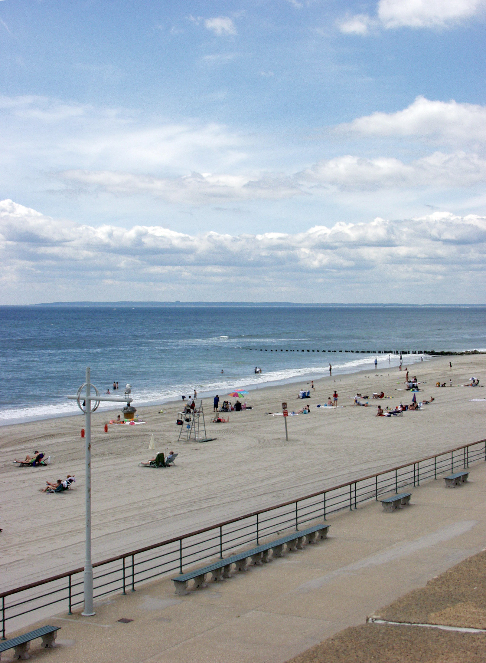 Jacob Riis Park beach and boardwalk with people