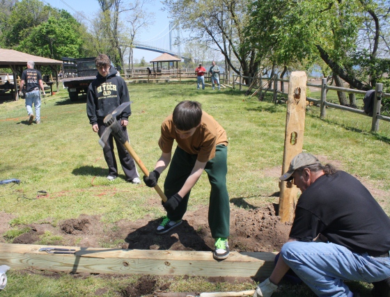 Staten Island Boy Scout Troop 37 builds tent pads at Fort Wadsworth's new Camp Hudson. Seven sites are available for overnight camping.