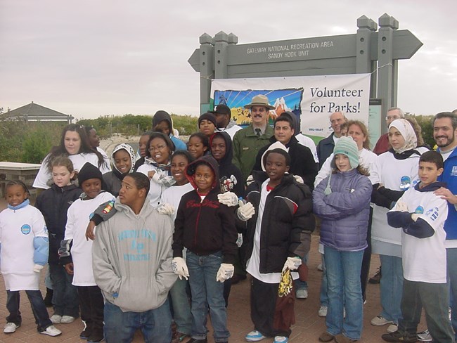 Tour America Volunteers help plant beach grasses at Gateway National Recreation Area's Sandy Hook Unit.