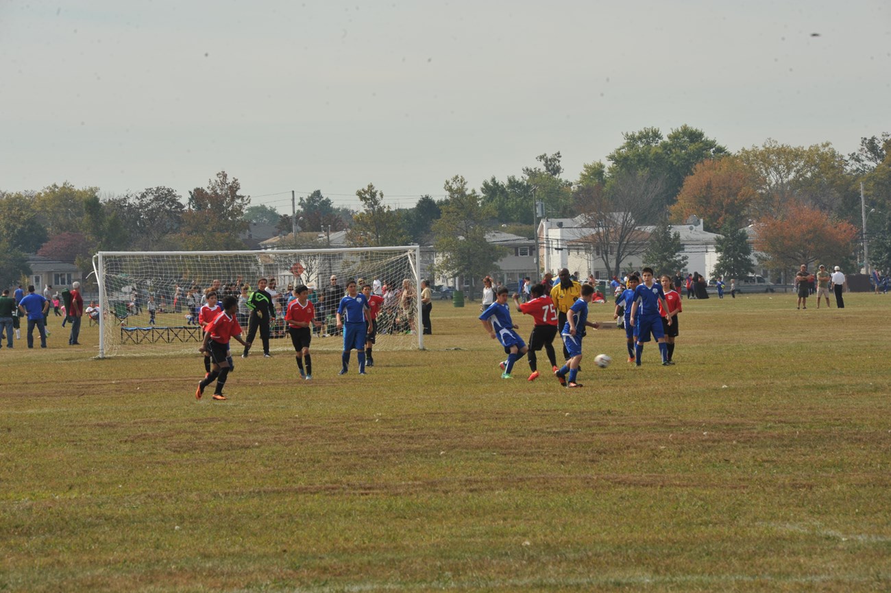 Lots of kids playing soccer