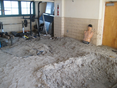 About two feet of sand covers the floor at this office in Jacob Riis Park's historic bathhouse.