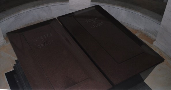 Two red granite sarcophagi sit side by side. Two red granite sarcophagi sit side by side.
