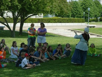 A school group listens as park ranger Pamela Nolan talks about the difficulties which faced Clark's men.