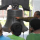 ranger points to crack in the Liberty Bell with children in foreground