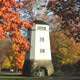 windmill amidst the fall foliage