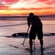 photographer on the beach