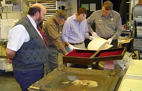 Examining relics of General Oliver O. Howard.