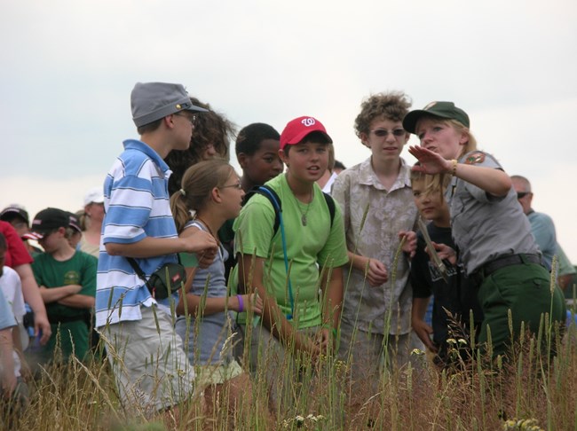 A group of young students attend a Park Ranger program.