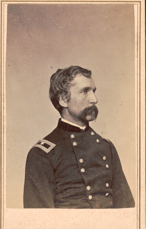 Photograph of a seated Joshua Chamberlain wearing a U.S. general's Civil War uniform