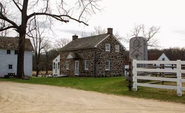 Photograph of a stone farmhouse owned by John Slyder