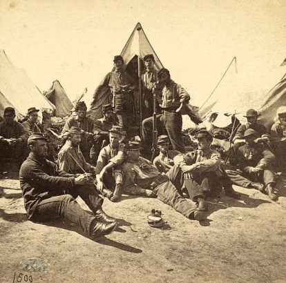 Civil War Soldiers Pass Time in Camp Several Civil War Soldiers Lounge around in camp
