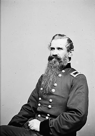 General John Robinson wearing a Union general's uniform sits for a photograph