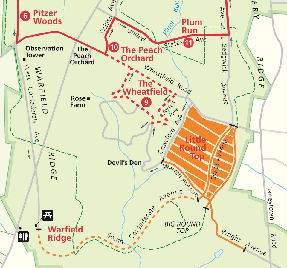 A color map showing a main auto tour route in red, a dashed red line for a car, bus, and motorcycle detour, and an orange dashed line for pedestrian use.