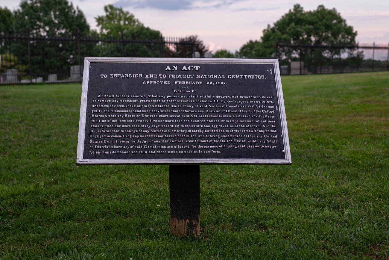 Cemetery Sign Sign that reads :An act to establish and to protect national cemeteries" with smaller text of the act underneath.
