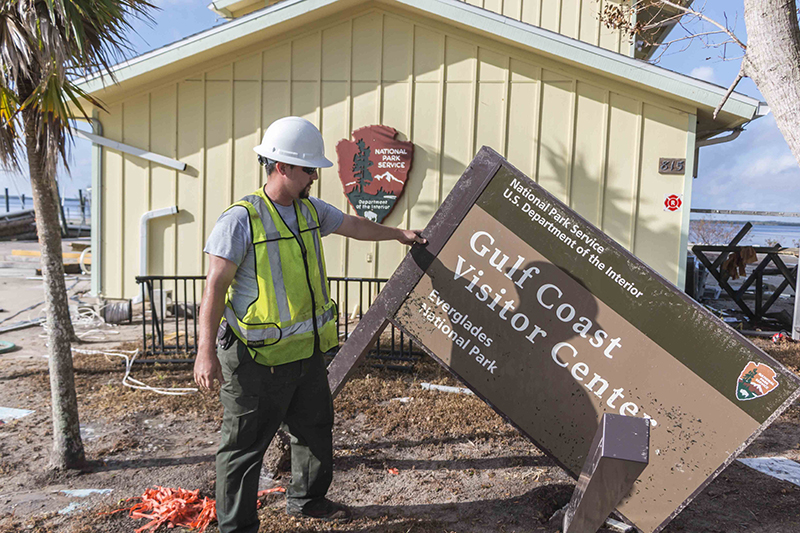 National Park Service personnel assess damage at the Gulf Coast Visitor Center at Everglades National Park.