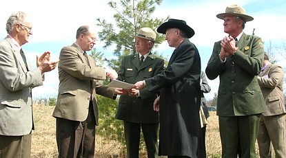 Officials at the Harman Farm transfer ceremony.