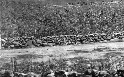 An 1863 view of a stone wall along the east side of Brickyard Lane. It's a detail view southeast from East Cemetery Hill. An 1863 view of a stone wall along the east side of Brickyard Lane.