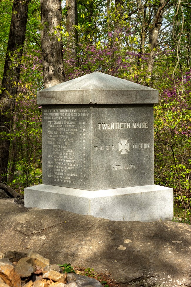 A stone square monument