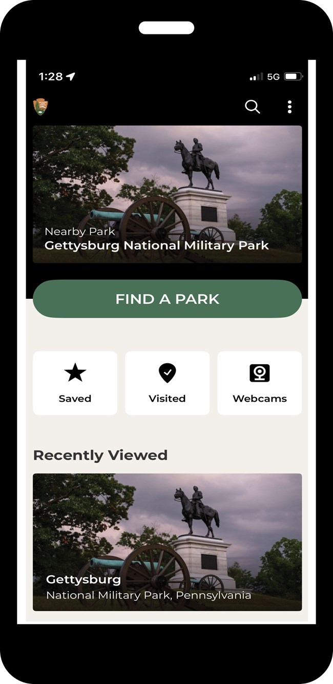 A smart phone with the Gettysburg National Military Park app showing. There is a photo of an equestrian statue and cannon at the top and bottom and a green line with the words Find A Park in the middle.