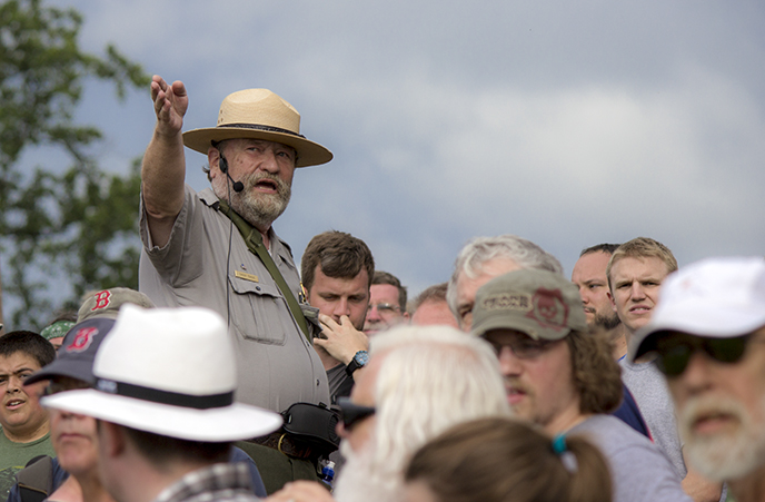 A Park Ranger leads a tour on the Gettysburg battlefield. A Park Ranger leads a tour on the Gettysburg battlefield.