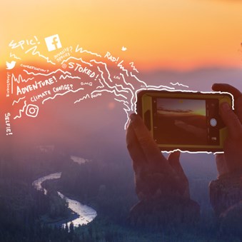 A person takes a sunset picture with their phone as illustrated words and squiggles emanate from the phone saying, "adventure, rad, stoked, epic!"