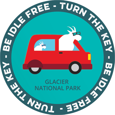Two cartoon mountain goats riding in a car with slogan that reads, 'Turn the Key-Be Idle Free!'
