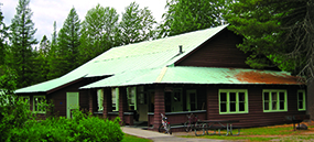 Brown building with green roof