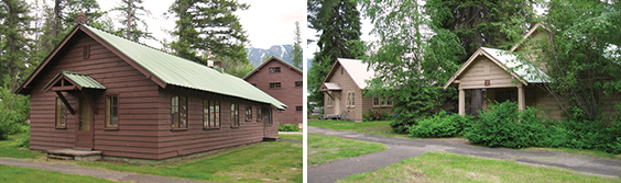 long brown building abd 2 smaller tan colored ones among trees