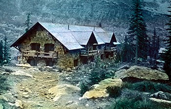 tinted historic slide of stone building with "GNR" above balcony