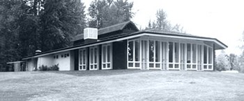 historic image of low profile building with many windows