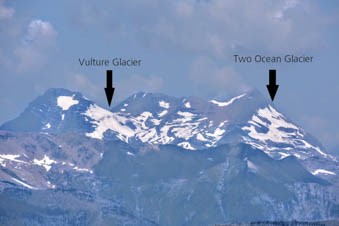 Snow and glaciers on high mountain peaks. Two labels indicate Vulture Glacier and Two Ocean Glacier.