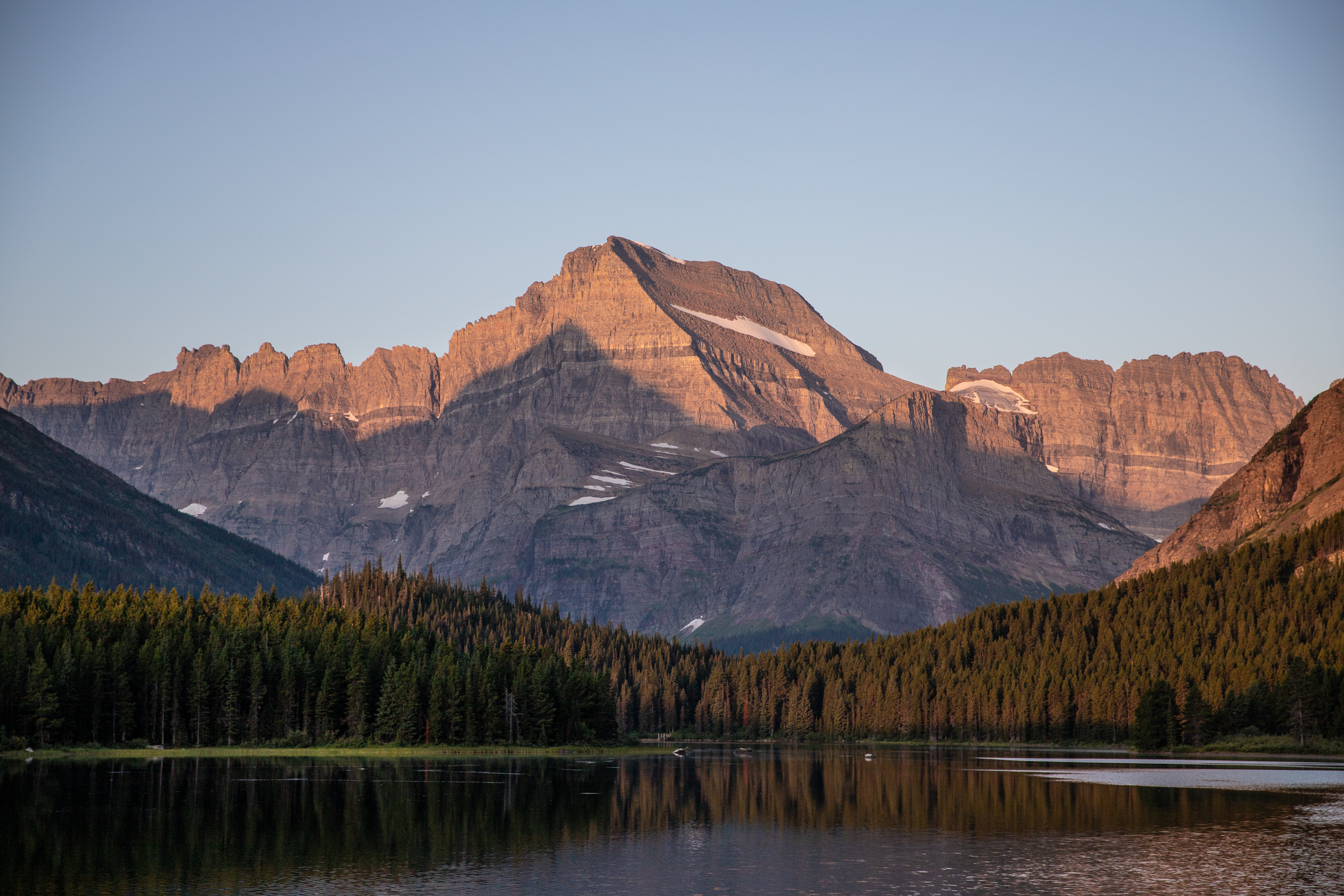 A sunrise mountain landscape scene.