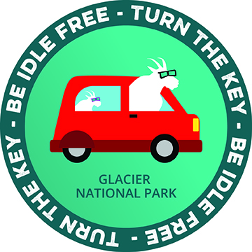 logo of goat in a red car with the words be idle free - turn the key surrounding it in a circle. logo of goat in a red car with the words be idle free - turn the key surrounding it in a circle.