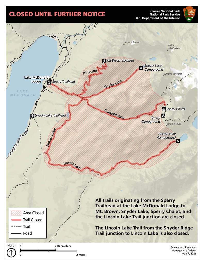 Alt text: The image is a Glacier National Park map showing a trail closure area near Lake McDonald. The closed zone is shaded in red diagonal lines, and the closed trails are marked with solid red lines.