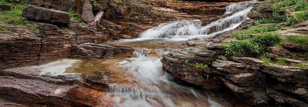 water falling over rocks
