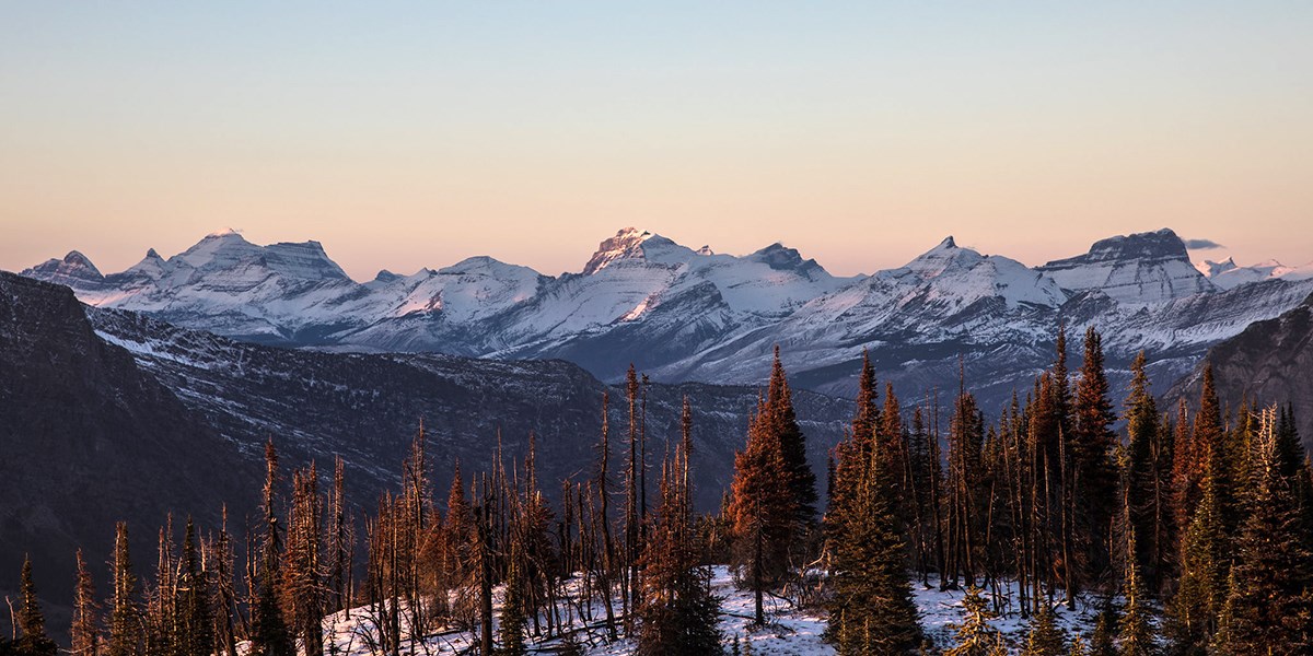 Evening light on mountains freshly dusted with new snow