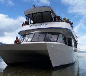 Climb aboard the tour boat to explore the wonders of Glacier Bay National Park