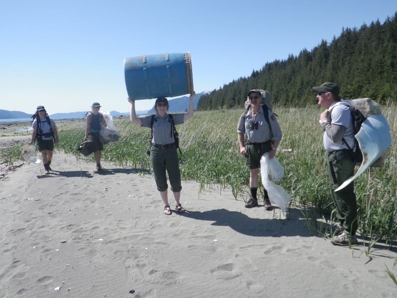 NPS staff collect trash on the beach NPS staff collect trash on the beach