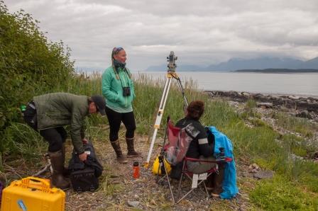 Researchers and equipment on an island. Researchers and equipment on an island.